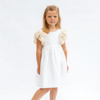 girls ivory linen dress with gold lace shoulders